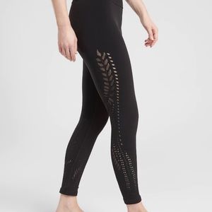 Athleta black tights with detailing up the leg